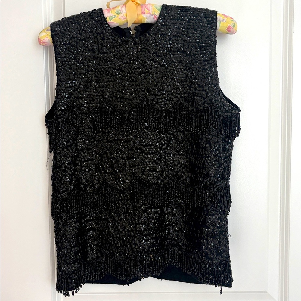 One of a kind hand sewn sequined top. Truly a beautiful piece.
